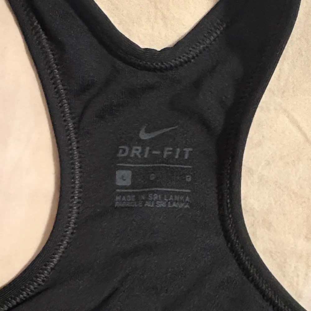 Nike Black Sports Bra with Silver and Gold Logo